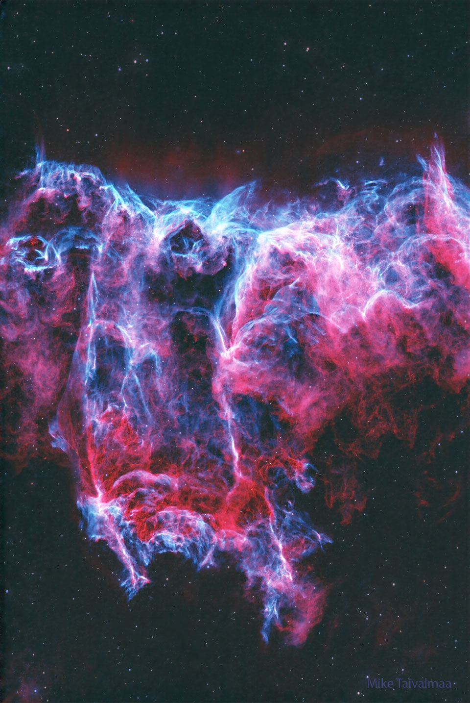 The featured image shows a starfield with a two-
colored nebula in the center. The nebula is colored 
mostly red and blue. 
Please see the explanation for more detailed information.